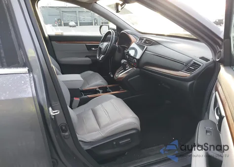 2019 Honda Cr-V Touring z USA, uszkodzony, nr VIN 7FARW2H94KE003139